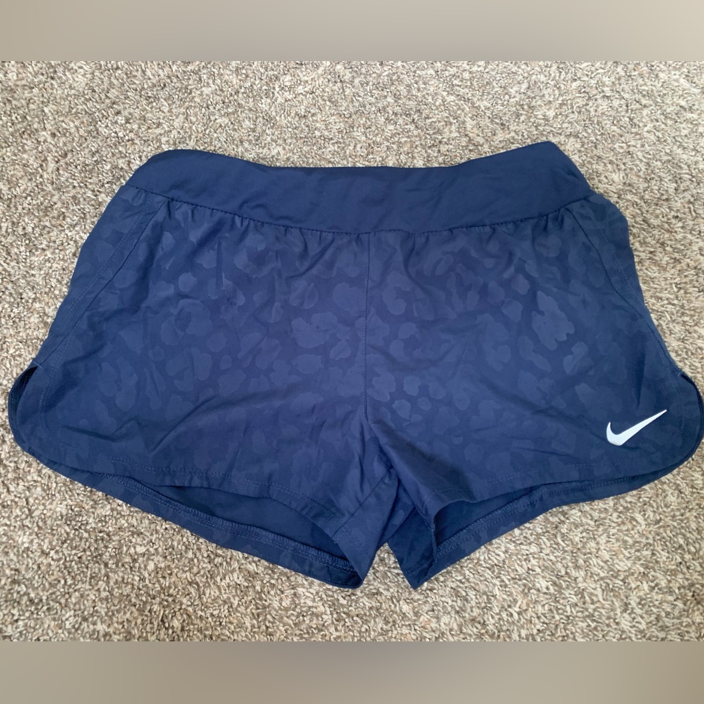 Nike blue cheetah print dri fit running shorts.